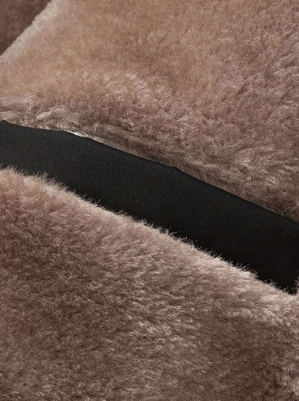 Close-up of Perpetua jacket hood, snap closures and fleece lining