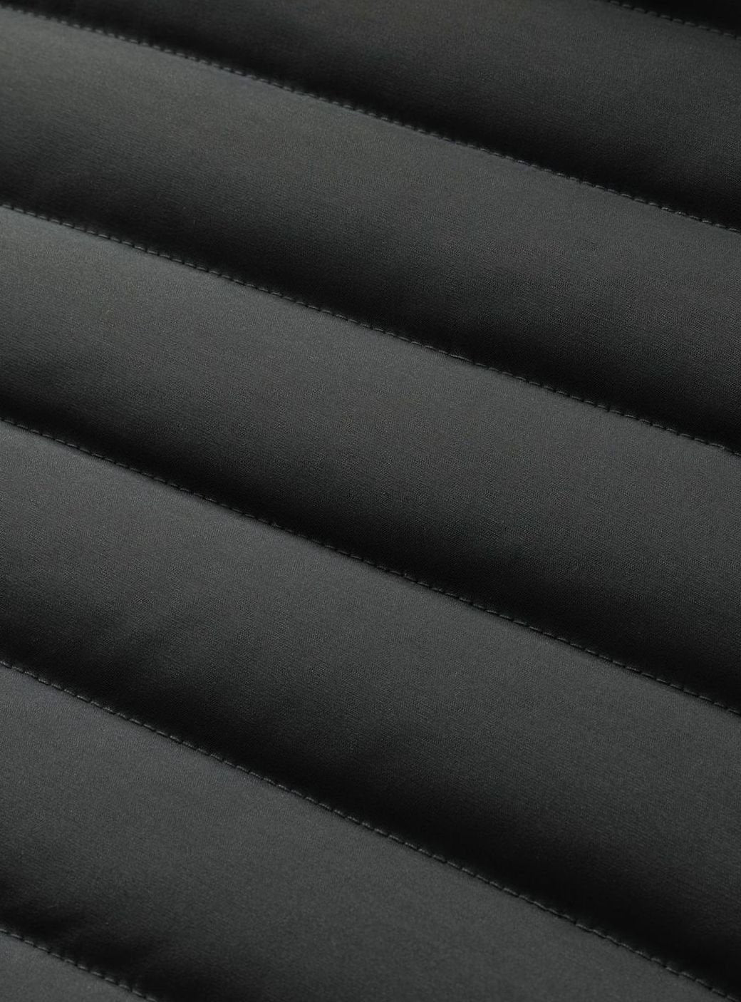 Close-up of Perpetua jacket hood, snap closures and fleece lining