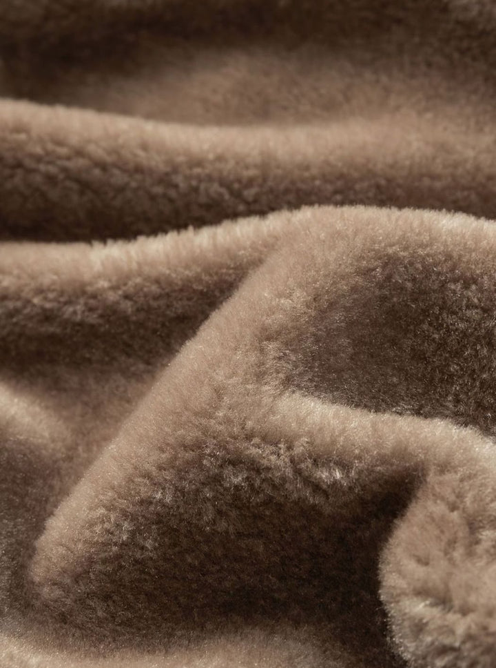 Close-up of Perpetua jacket hood, snap closures and fleece lining