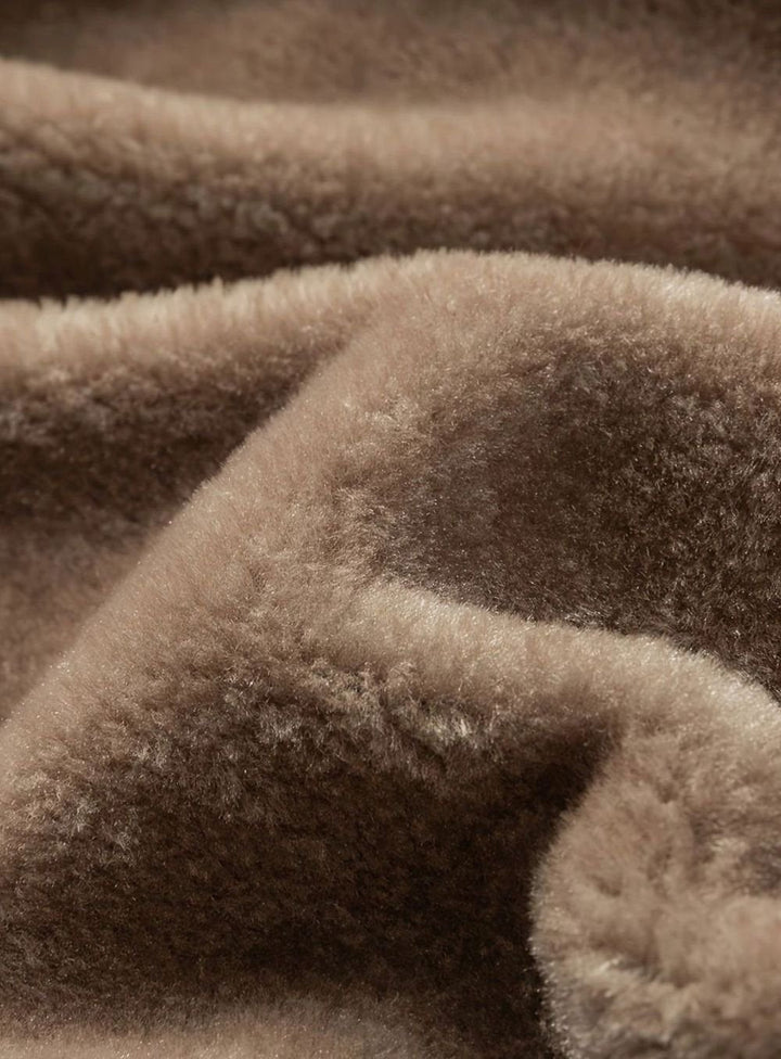 Close-up of Perpetua jacket hood, snap closures and fleece lining