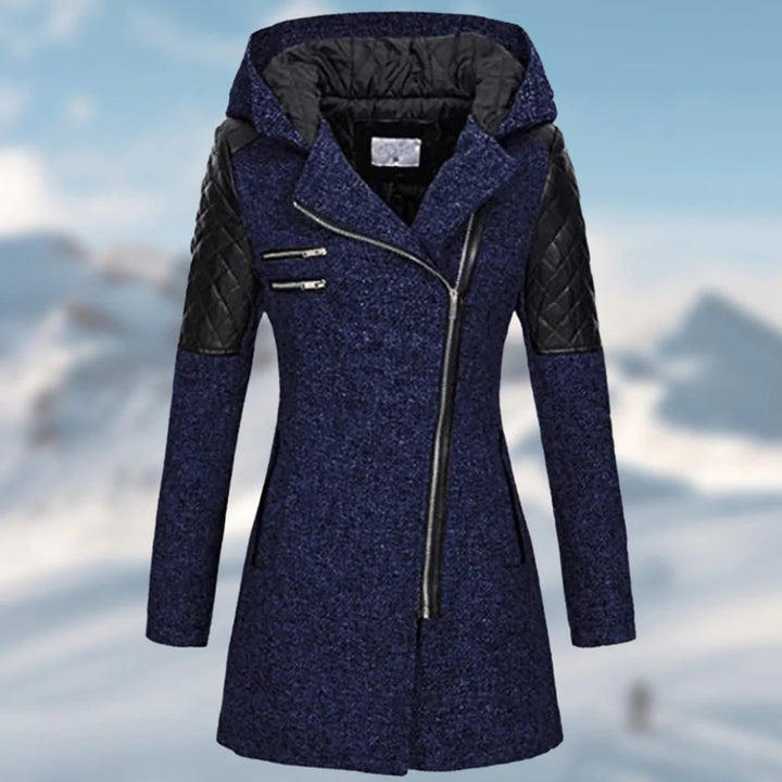 Imelda winter coat close-up of quilted sleeve panel and zipper pockets