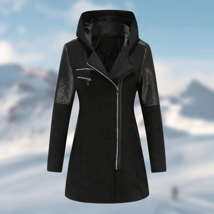 Imelda winter coat close-up of quilted sleeve panel and zipper pockets