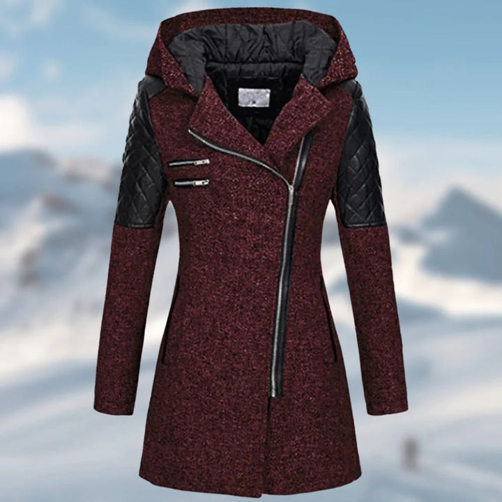Imelda winter coat close-up of quilted sleeve panel and zipper pockets