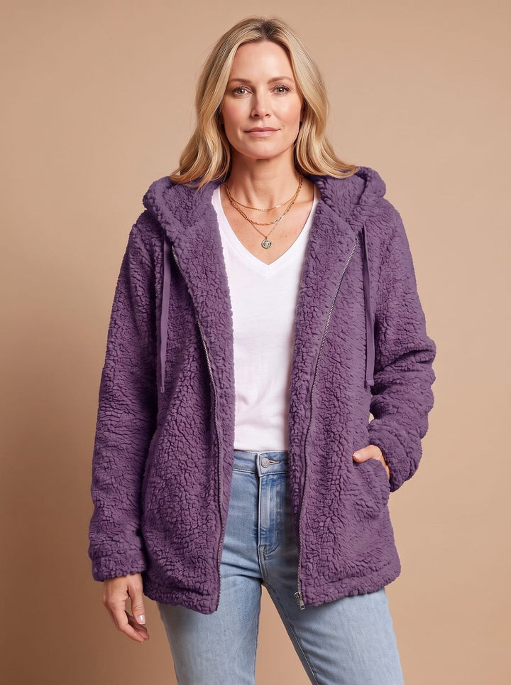 Faustina hooded teddy fleece jacket in beige, front view with hands in pockets