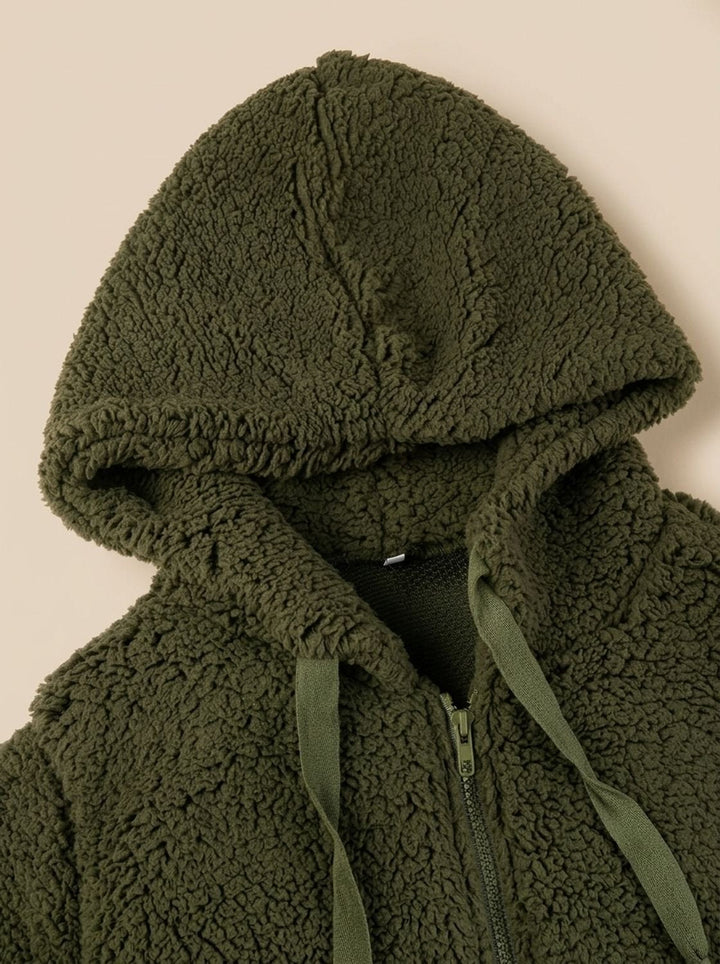 Faustina hooded teddy fleece jacket in beige, front view with hands in pockets
