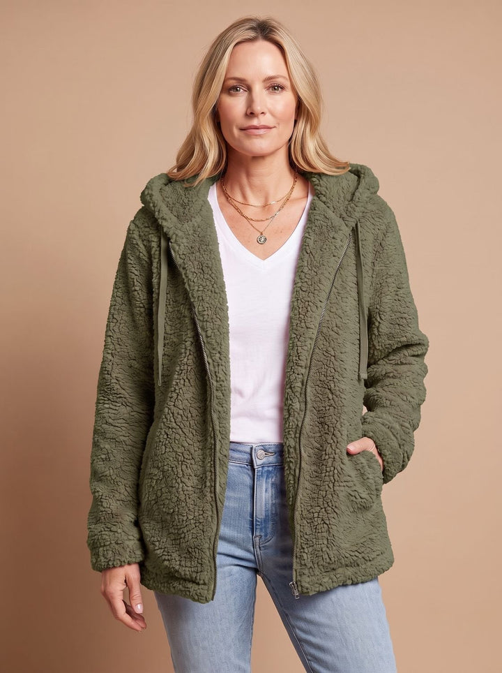 Faustina hooded teddy fleece jacket in beige, front view with hands in pockets