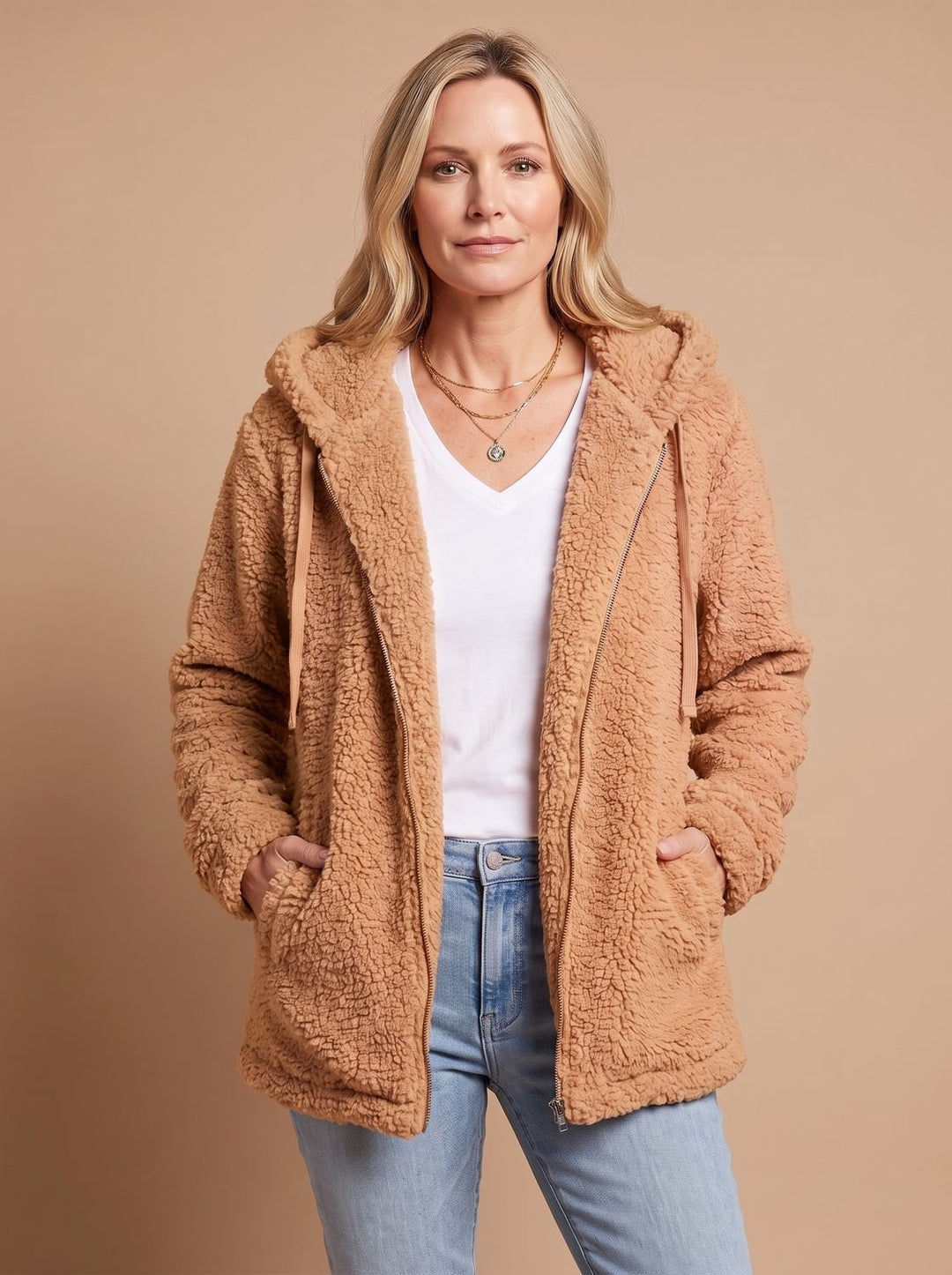 Faustina hooded teddy fleece jacket in beige, front view with hands in pockets