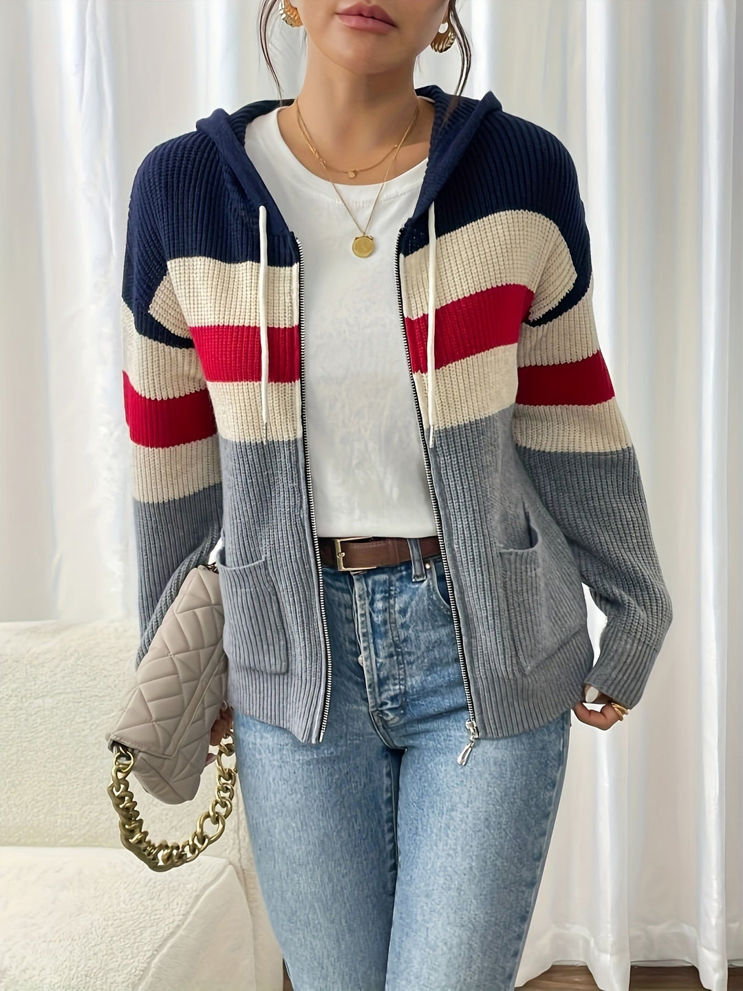 Faelyn hooded zip-up cardigan styled with jeans, front view