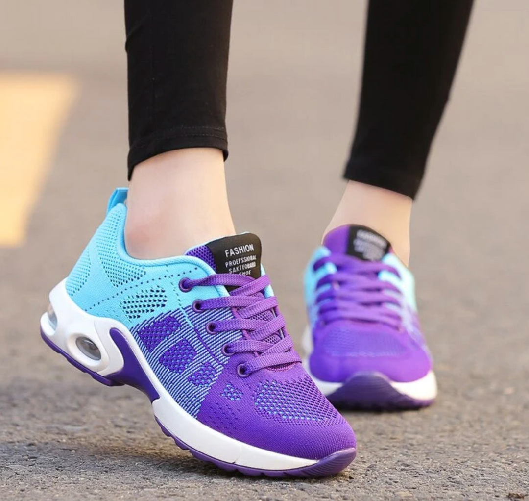 Felicity pink and grey lace-up cushioned sneakers, close-up on feet