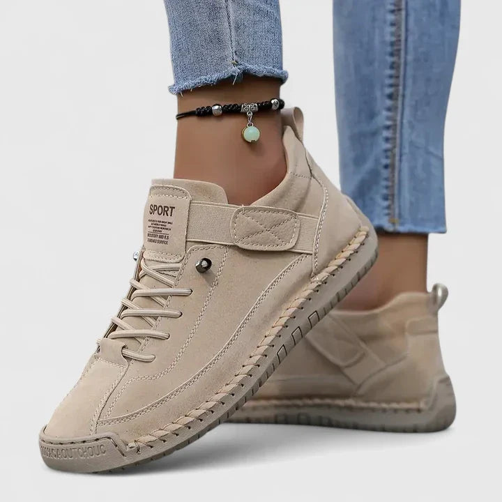 Noor beige lace-up low-top sneakers on model, side view
