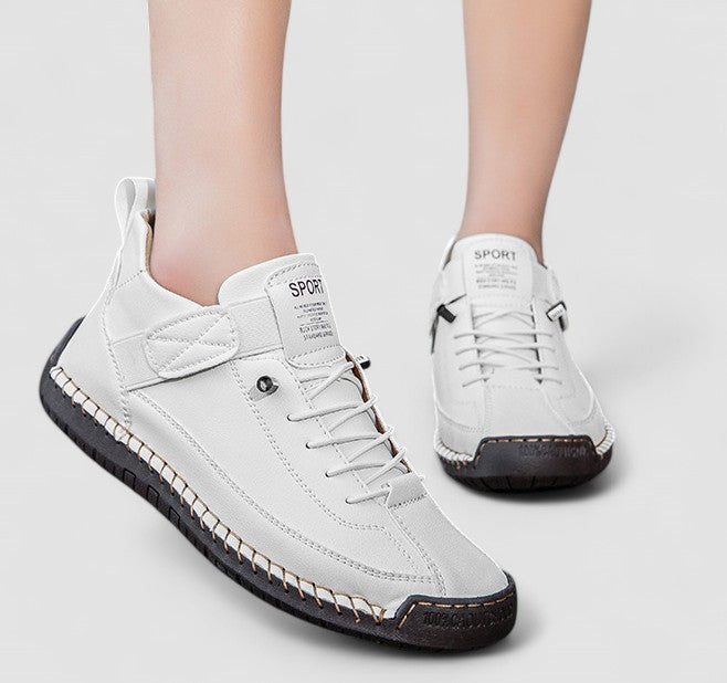 Noor white lace-up sneakers on model, front view