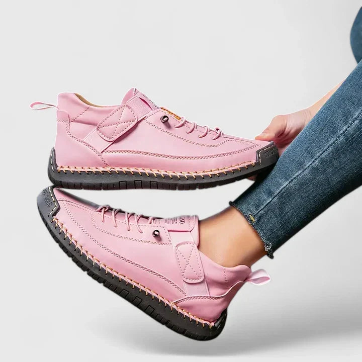 Noor pink lace-up sneakers, side profile pair