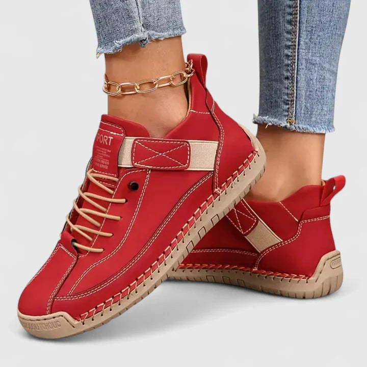 Noor dark blue lace-up sneakers on model, side view