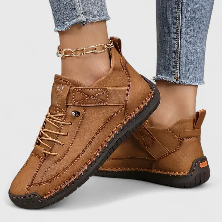 Noor dark blue lace-up sneakers on model, side view