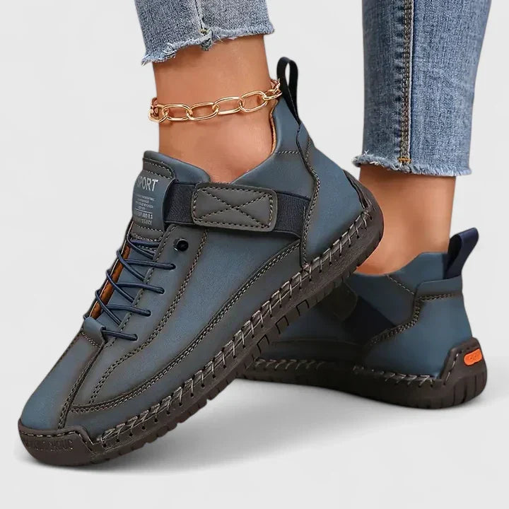 Noor dark blue lace-up sneakers on model, side view
