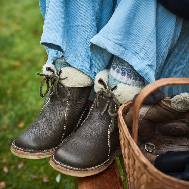 Rosemarie winter boots styled outdoors with corduroy pants