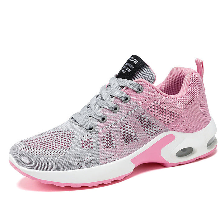 Marguerite pink and white lace-up sneakers, close-up on model