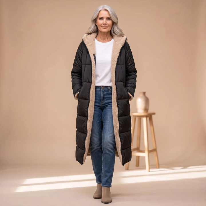 Rosalind long winter puffer jacket in black with hood, styled with jeans