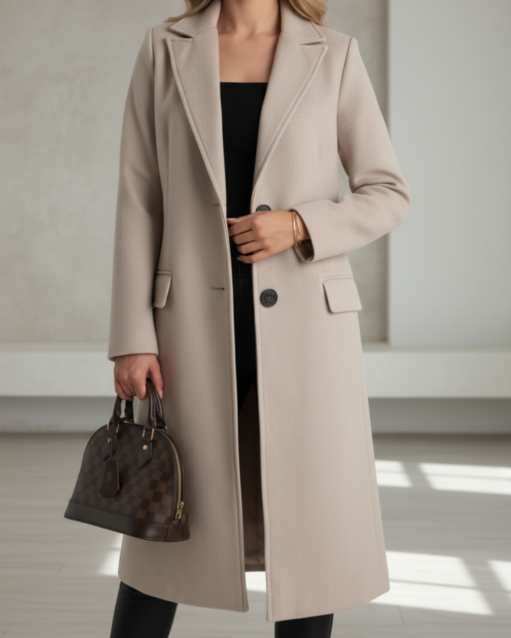 Marguerite beige longline coat buttoned, front detail with handbag