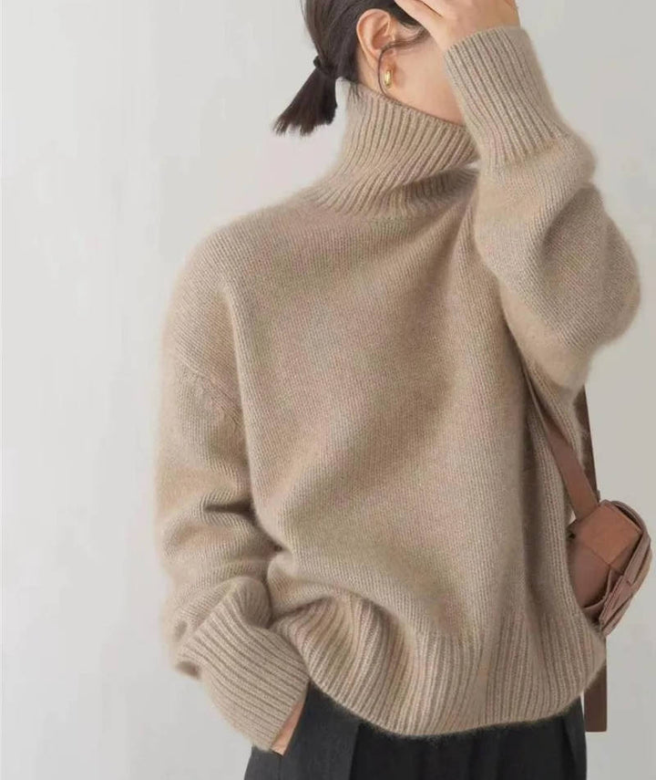Thessaly turtleneck sweater styled with trousers, side view