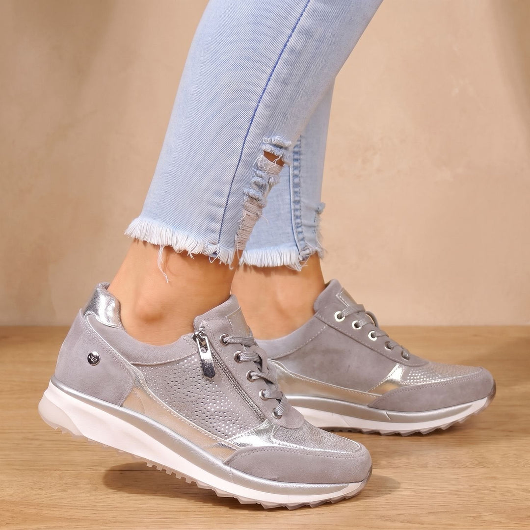 Guadalupe gray lace-up sneakers with metallic accents, side view on model