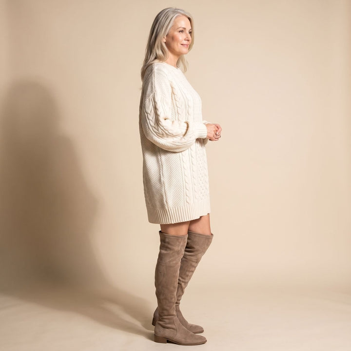 Marcella cable knit sweater dress, side profile view