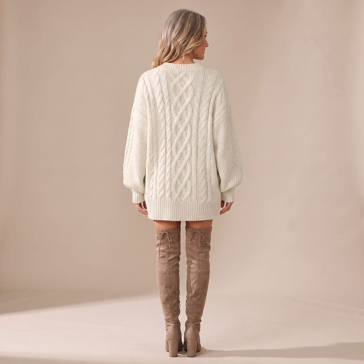 Marcella cable knit sweater dress, back view showing cable pattern