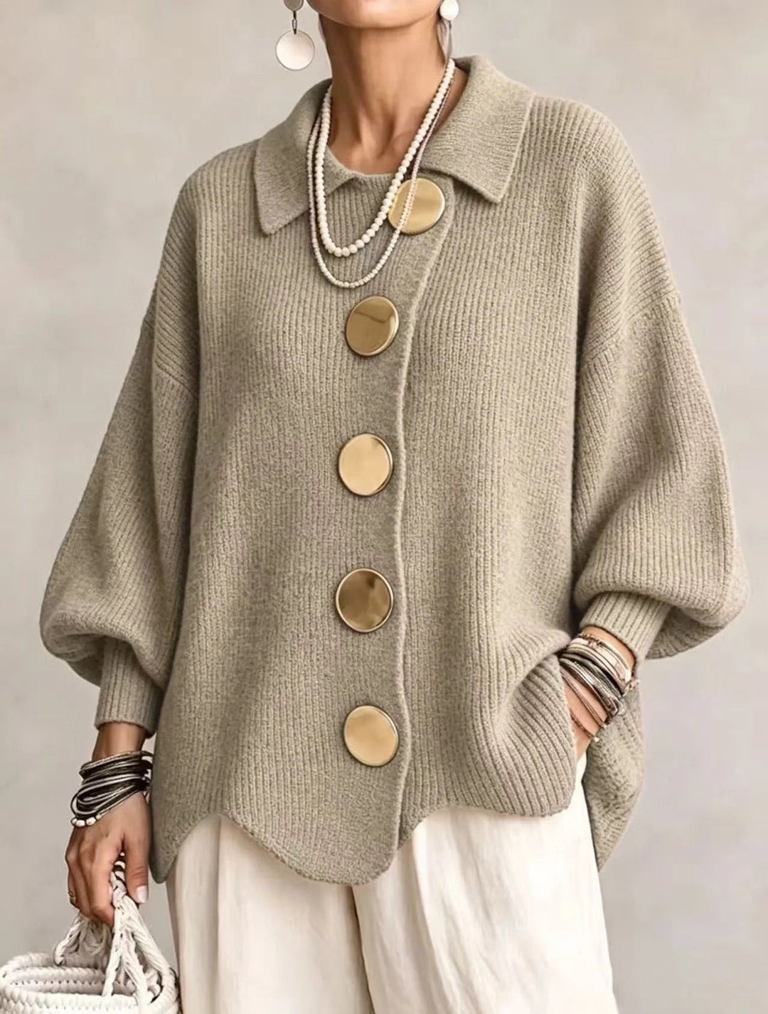 Thessaly cream oversized cardigan with scalloped hem, front view