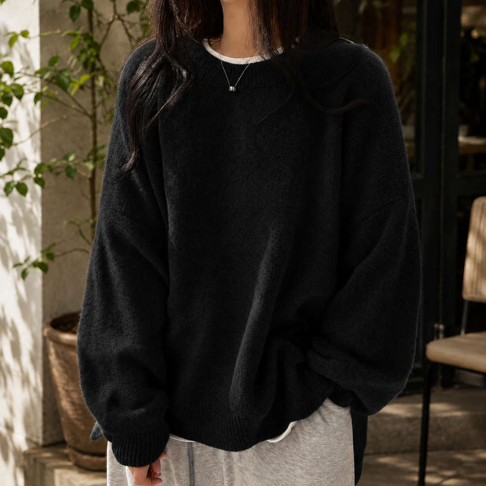 Marcelline oversized fluffy crew neck sweater in black, front view