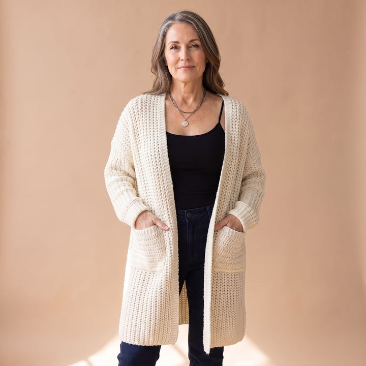 Marcelina long open-front cardigan worn over casual outfit, front view