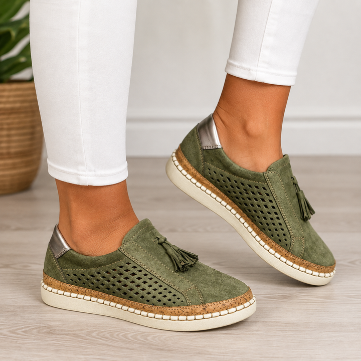 Marisette green perforated slip-on loafers with tassel detail