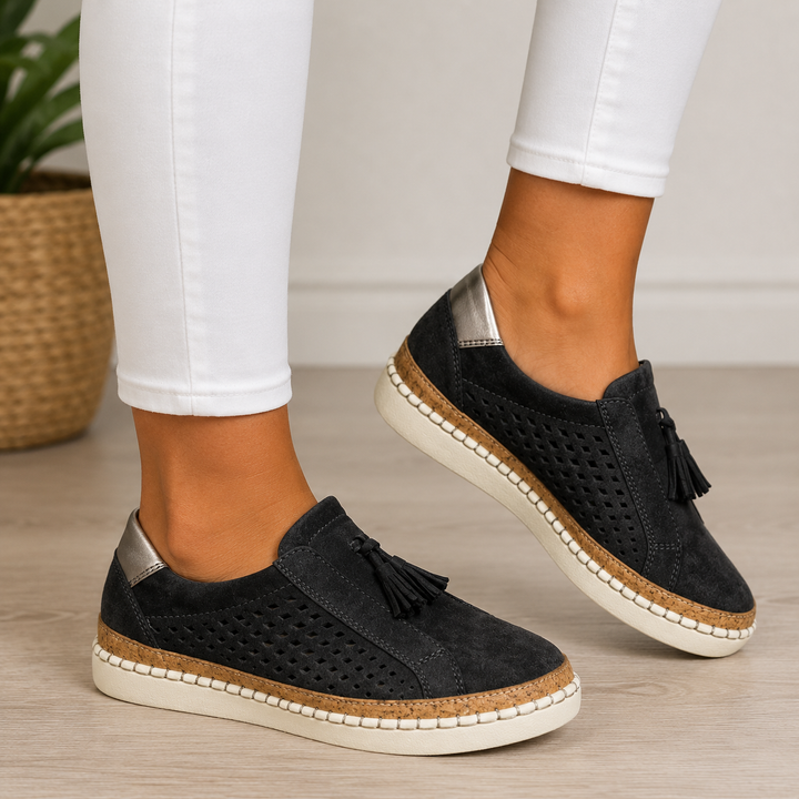 Marisette green perforated slip-on loafers with tassel detail