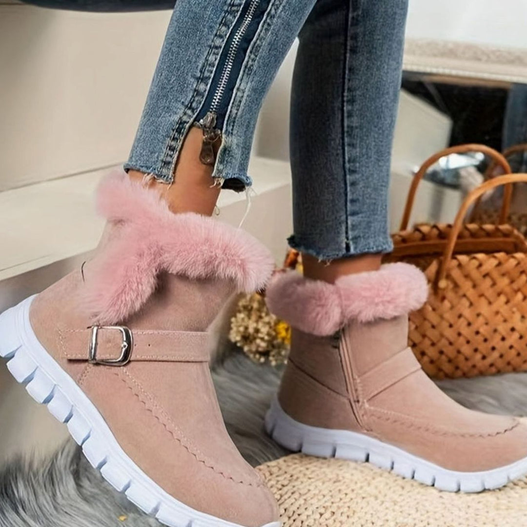 Faustine plush trim ankle snow boots in pink, front view on model