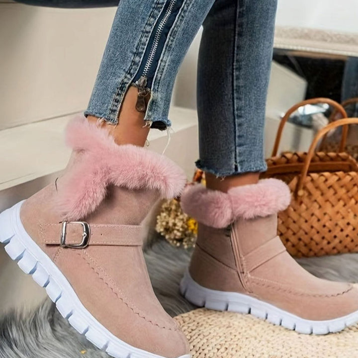 Faustine plush trim ankle snow boots in pink, front view on model