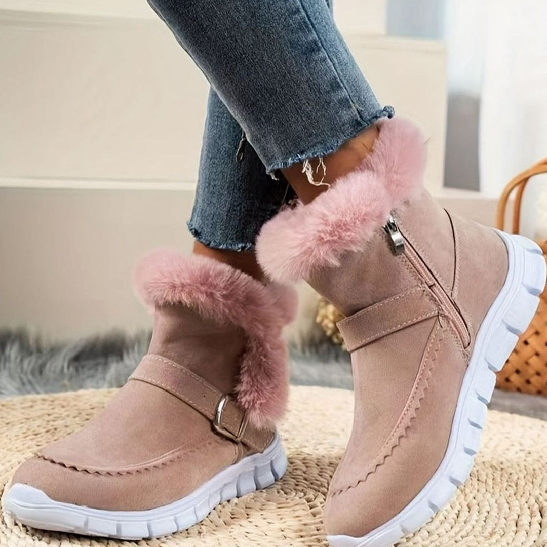 Faustine plush trim ankle snow boots in pink, close-up side profile with zipper