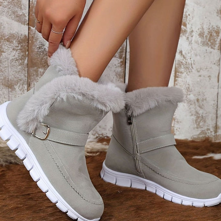 Faustine plush trim ankle snow boots in pink, close-up side profile with zipper