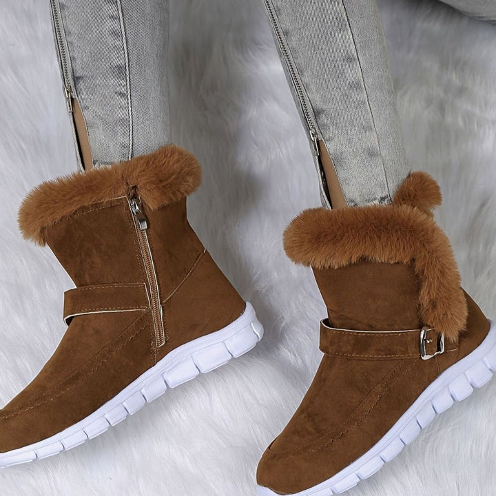 Faustine plush trim ankle snow boots in pink, close-up side profile with zipper