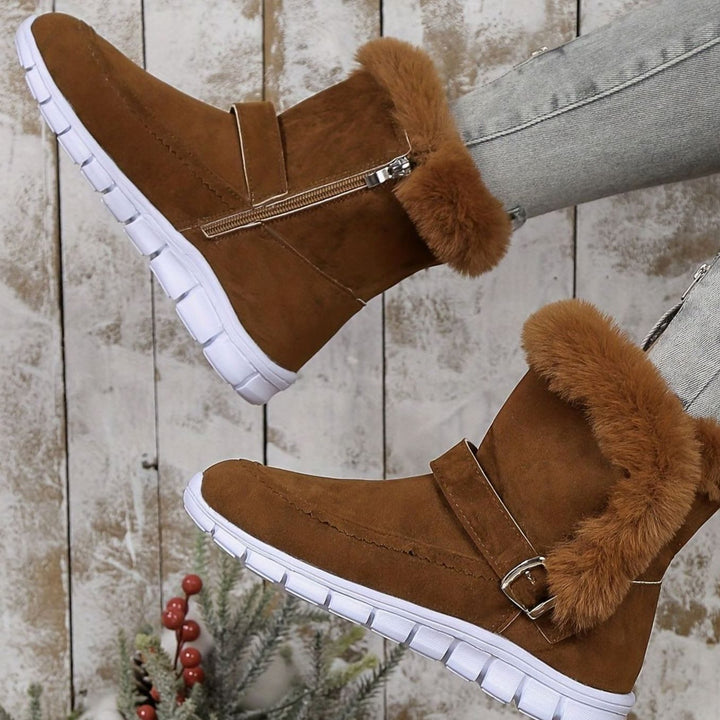 Faustine plush trim ankle snow boots in pink, close-up side profile with zipper