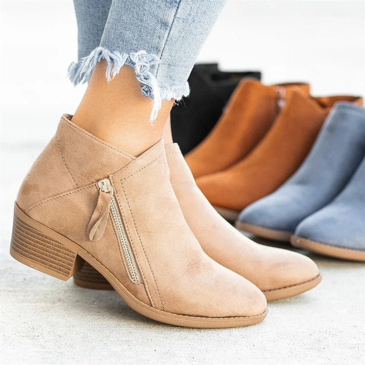 Brynlee pointed toe ankle boots in beige, side view with zipper detail