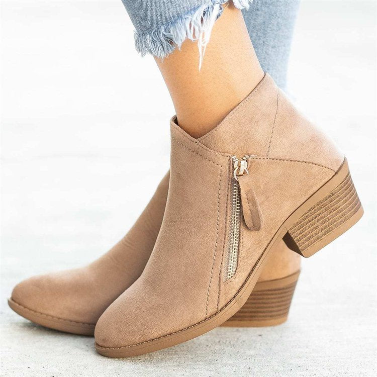 Brynlee pointed toe ankle boots in blue, side view with stacked heel