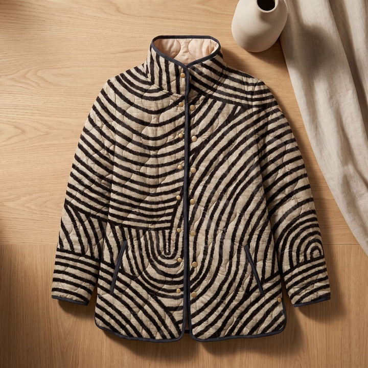 Rosamund quilted swirl-print jacket laid flat showing button front and side pockets
