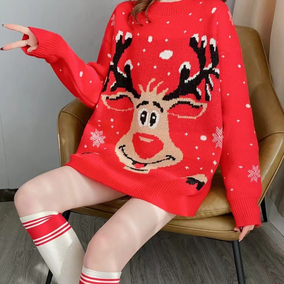 Juniper reindeer print sweater styled with striped socks, seated pose
