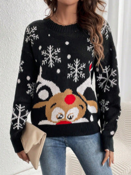 Rosamund reindeer Christmas sweater styled with jeans