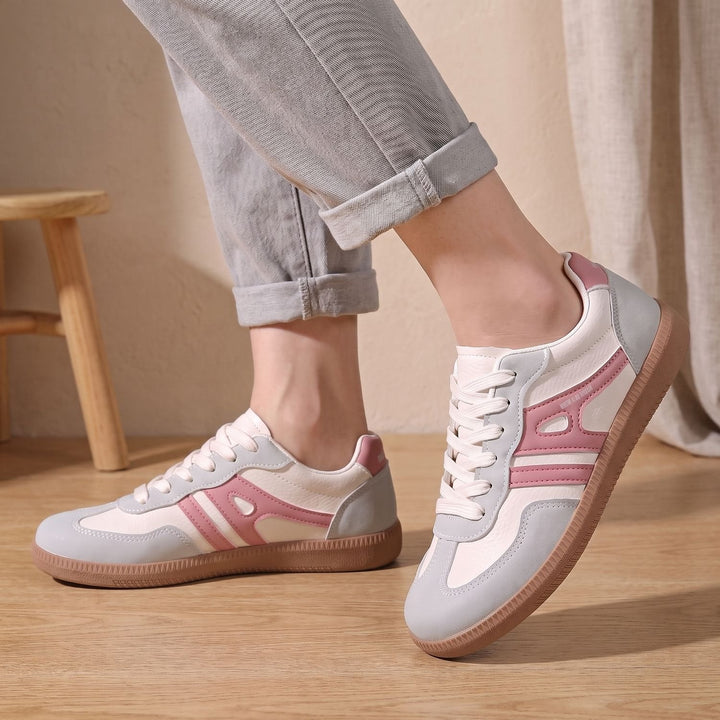 Thalassa retro court lace-up sneakers in pink and gray, side view on model