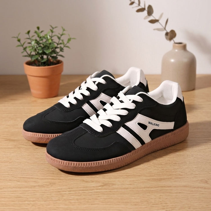 Thalassa retro court lace-up sneakers in black and white, side view