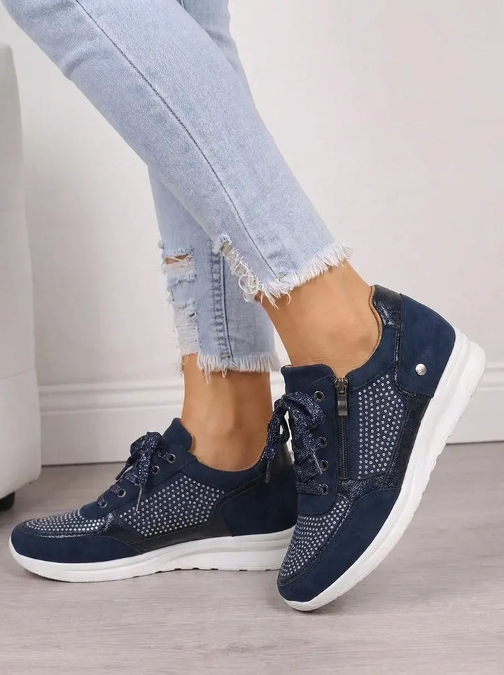 Marguerite platform sneakers, side view showing zipper closure