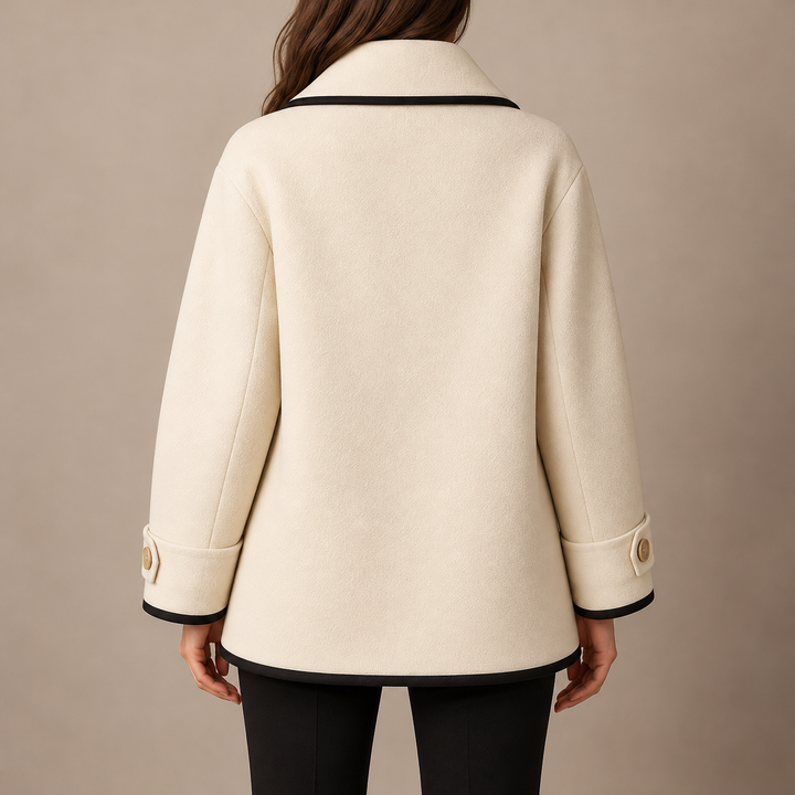 Delphine wool coat back view showing swing silhouette