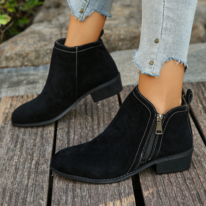 Verlaine black ankle boots with topstitched detail, side view