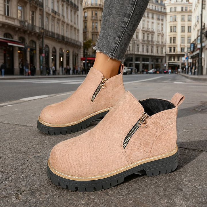 Odessa ankle boots in blush pink, side profile on model