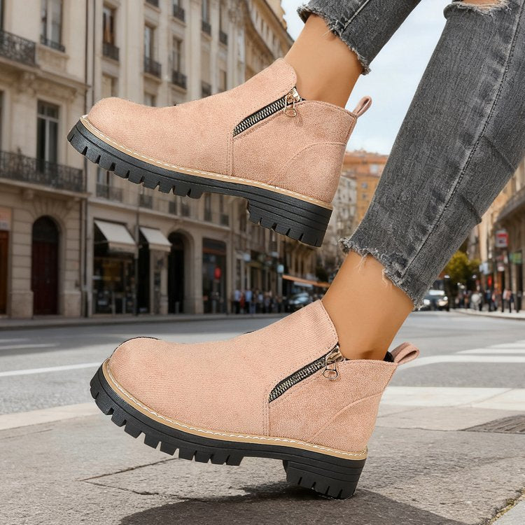 Odessa ankle boots in blush pink, dynamic angled view